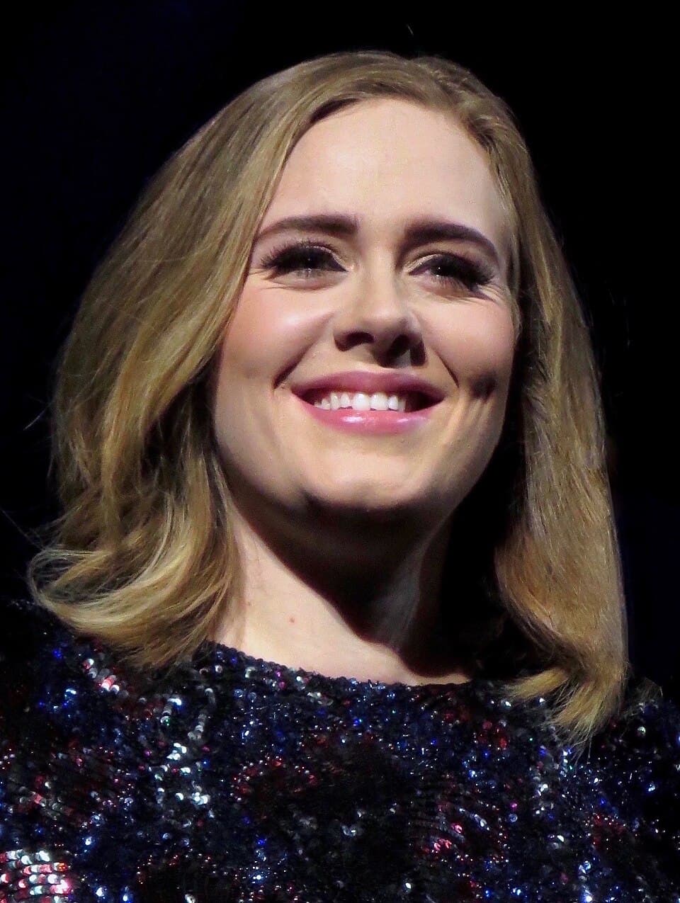 Adele performing at a public concert
