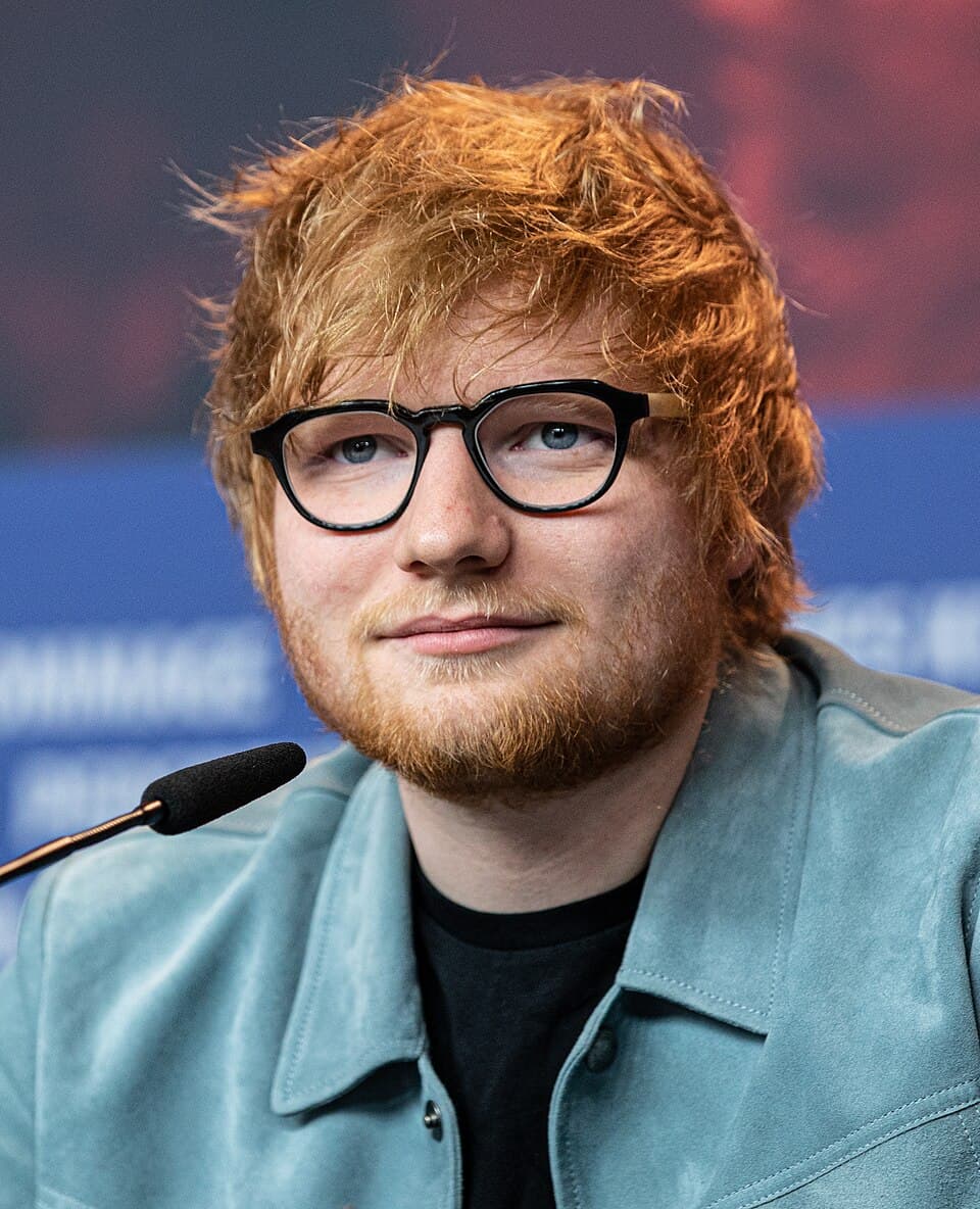 Ed Sheeran performing at a public concert
