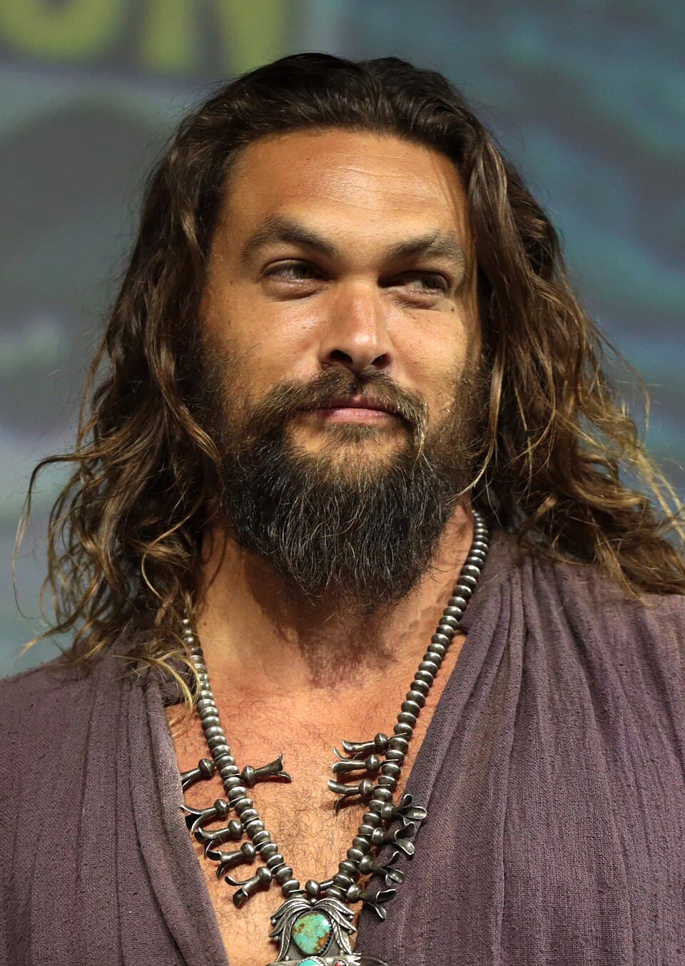 Jason Momoa speaking at a public film convention